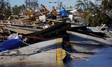 Responders survey damage to the bridge leading to Pine Island in Matlacha, Florida, in the wake of Hurricane Ian.