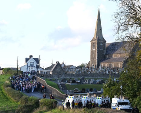 Orange men and supporters are blocked by police outside Drumcree church