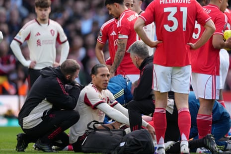 Virgil van Dijk gets medical assistance after a clash of heads.