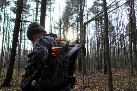 Crossbow hunter in Canadian woods