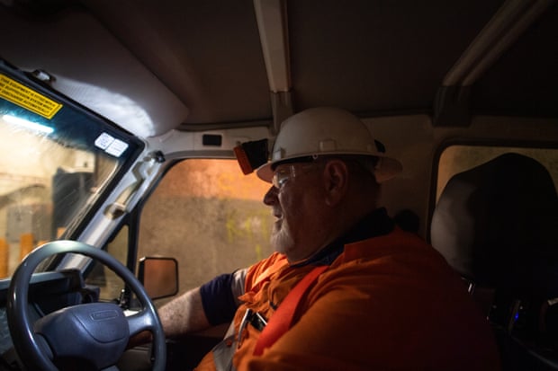Superintendant of Mining John Bourne driving the vehicle to the Stawell Underground Physics Laboratory