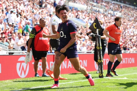Marcus Smith of England celebrates after scoring their team’s first try