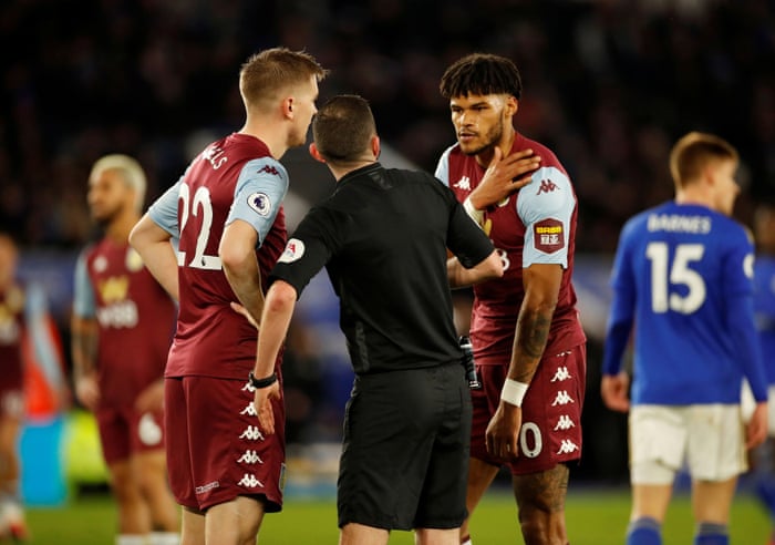 Tyrone Mings appeals to referee Michael Oliver.