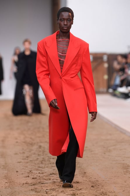 A model in a red coat