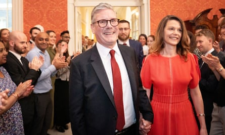 Keir Starmer and his wife, Victoria, being clapped into No 10 on 5 July this year after Labour’s election victory.