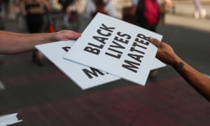 Protesters hold racial inequality protests near the White House in?Washington<br>Protesters carry Black Lives Matter signs on a road during racial inequality protests in downtown?Washington DC, U.S., June 23, 2020. REUTERS/Leah Millis