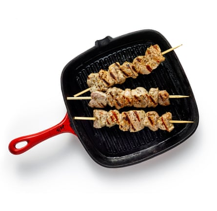 Thread the marinated meat onto skewers and onto the griddle.