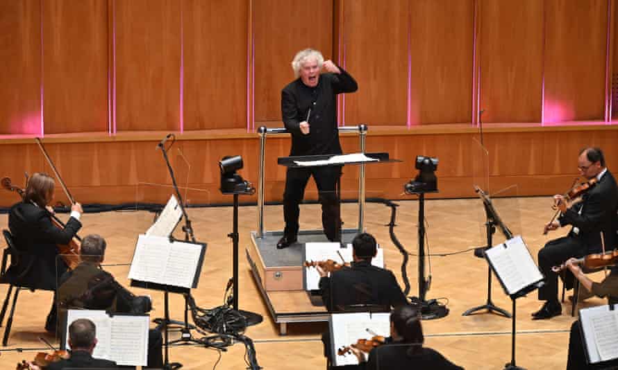 Sir Simon Rattle conducts the LSO at LSO St Luke’s in London last year.