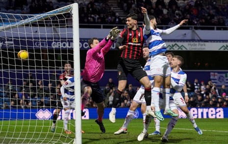 Bournemouth's Kieffer Moore (centre) heads in his side’s second goal to equalise at QPR.