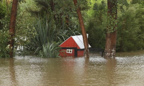 Flood waters around homes in Kumeu, Auckland on Tuesday.