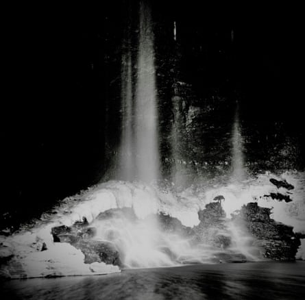 A waterfall at night.