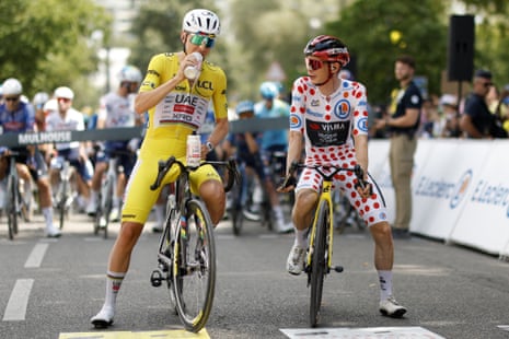 Tadej Pogacar and Jonas Vingegaard wait at the start