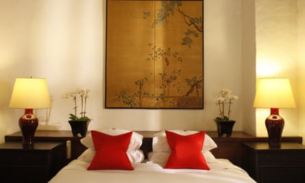 A bedroom at the luxurious Rachamankha hotel