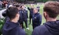 Ange Postecoglou meets AFL players during a Tottenham training session at Melbourne’s AAMI Park. 