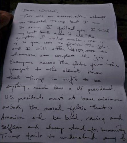 A letter handwritten in cursive font on a blank sheet of paper starts off with “Dear World”