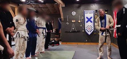 People standing in a martial arts studio