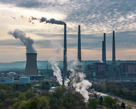 Pollution and steam rise from the Miami Fort power station.
