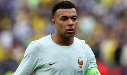 Close up of Kylian Mbappe with his France jersey featuring a raised shoulder seam.