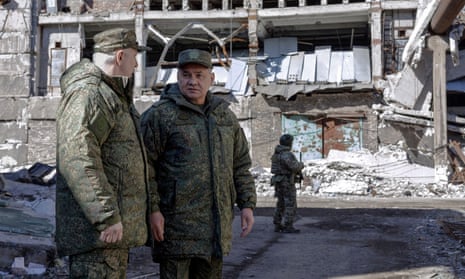 Sergei Shoigu inspects the positions of Russian troops at an undisclosed location in Ukraine on Saturday