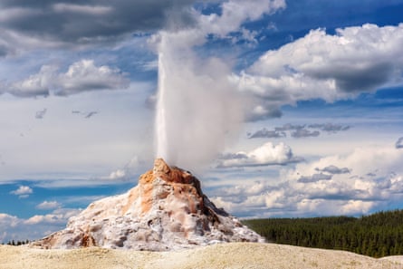 wide shot of a geyser erupting