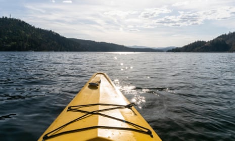 Kayaking in a yellow boat on Couer D'Alene, Idaho.