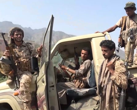 A screengrab of video released by the Houthi authorities shows fighters during an offensive in the port city of Mocha, Yemen.