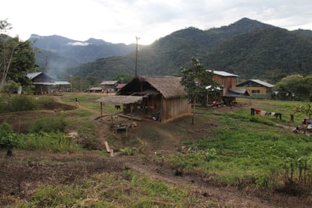 Shuar homes in the village of  Tsuntsuim