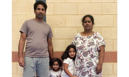 Tamil couple Nades (left) and Priya Murugappan (right) with their Australian-born daughters, Kopika, and Tharunicaa, at the detention centre on Christmas Island. 
