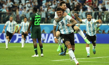 Marcos Rojo celebrates his late goal with Lionel Messi.