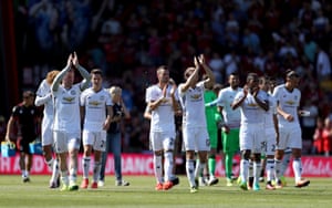 Manchester United’s players applaud the fans after the final whistle.