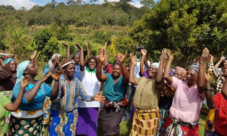 A tree-planting group close to Mount Kenya sings together