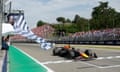 Red Bull Racing's Dutch driver Max Verstappen crosses the finish line to win the Emilia Romagna Formula One Grand Prix at the Autodromo Enzo e Dino Ferrari.