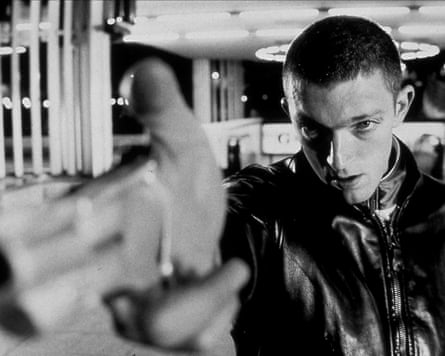 Black-and-white still of the character, Vinz, in the 1995 film La Haine