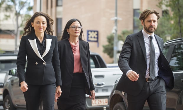 Counsels assisting the coroner Peggy Dwyer, Patrick Coleridge and solicitor Maria Walz (centre) arrive for the inquest into the death of Kumanjayi Walker