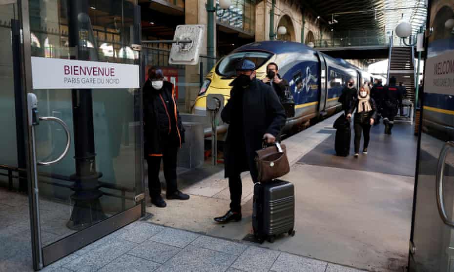 Passengers arrive at the Eurostar terminal at Gare du Nord train station in Paris