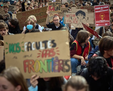 Protesters rally during a demonstration of high-school students as part of a nationwide protest movement over learning conditions in Paris.