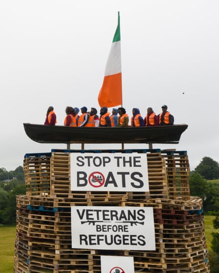 Effigies and the flag of the Republic of Ireland on the Moygashel bonfire