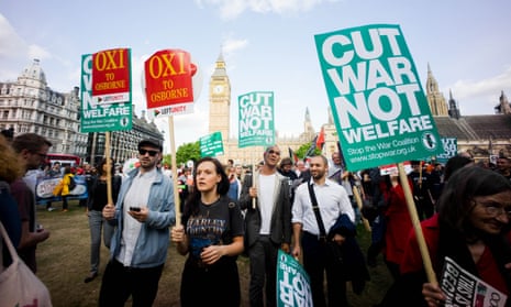 Anti austerity protesters gather outside parliament square as the Chancellor George Osborne announced his budget. Photograph: Geovien So/Barcroft Media