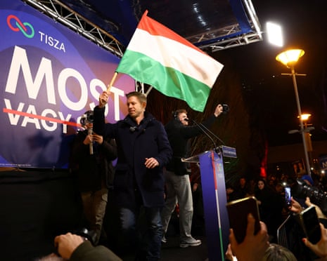 Péter Magyar, leader of the opposition TISZA party holds a Hungarian flag during his election campaign tour in Salgotarjan, Hungary.