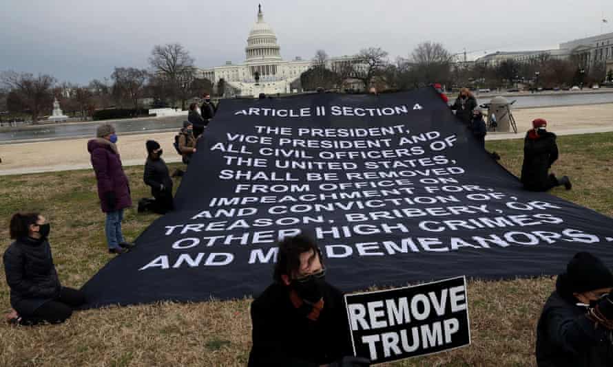 Demonstrators gather in front of the US Capitol, demanding Donald Trump’s removal.
