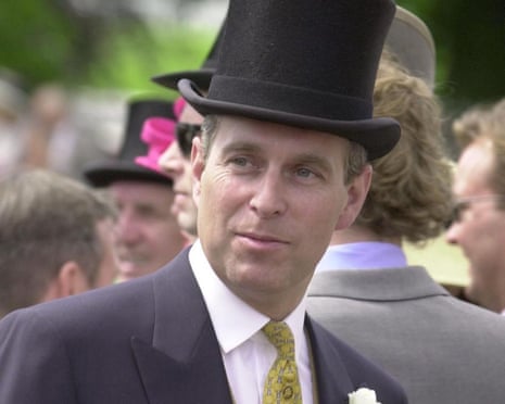 Andrew Mountbatten-Windsor in a dark suit and tall top hat stands in a crowd at Royal Ascot in 2002