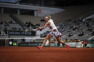 Petra Kvitova returns a shot as she fights to stay in the match against Sofia Kenin.
