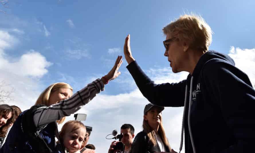 Elizabeth Warren greets supporters during a visit to a caucus site at Coronado high school in Henderson.