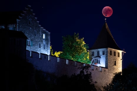 Here the moon appears as a giant weathervane on top of the Castle Luafen’s turret, in Switzerland.