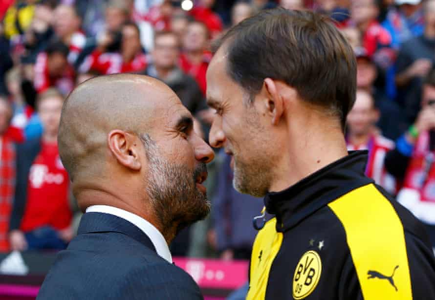 Thomas Tuchel talks to Pep Guardiola before his Borussia Dortmund team take on Bayern Munich in October 2015.