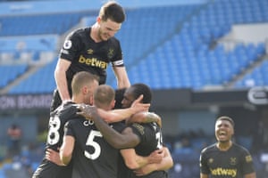 Michail Antonio of West Ham United is congratulated by his team mates after scoring their equaliser.