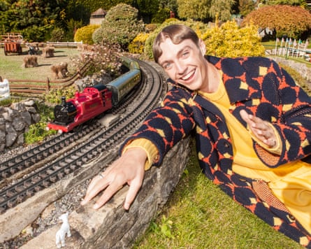 Francis Bourgeois next to a model train
