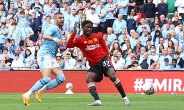 Manchester United's Kobbie Mainoo scores their second goal against Manchester City.