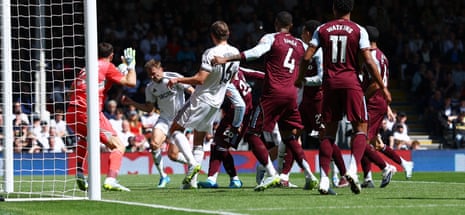 Timothy Castagne scores a Fulham goal that was subsequently disallowed for a foul on Aston Villa goalkeeper Emi Martinez.