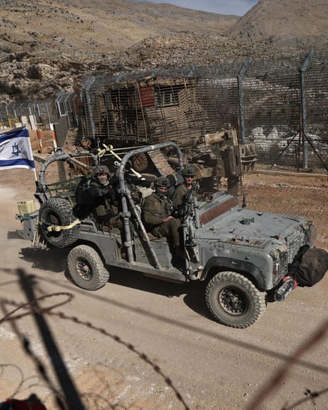 Israel boosts troop presence on Golan Heights amid developments in Syriaepa11780868 Israeli soldiers on a military vehicle on their way out of the Syrian side of the border, between Israel and Syria, near the Druze village of Majdal Shams, in the Israeli-annexed Golan Heights, 16 December 2024. Israel's military said that its troops are conducting 'defense activities' along the border with Syria in the Golan Heights, northern Golan Heights, and Mount Hermon, to prevent 'any threat' from 'terrorist elements' in the area. EPA/ATEF SAFADI